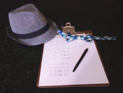 A hat, bow-tie, and some math on a clipboard